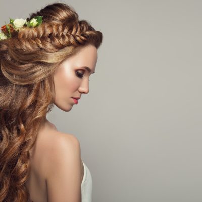 close-up-portrait-of-young-beautiful-woman-with-flowers--e1595429743327.jpg